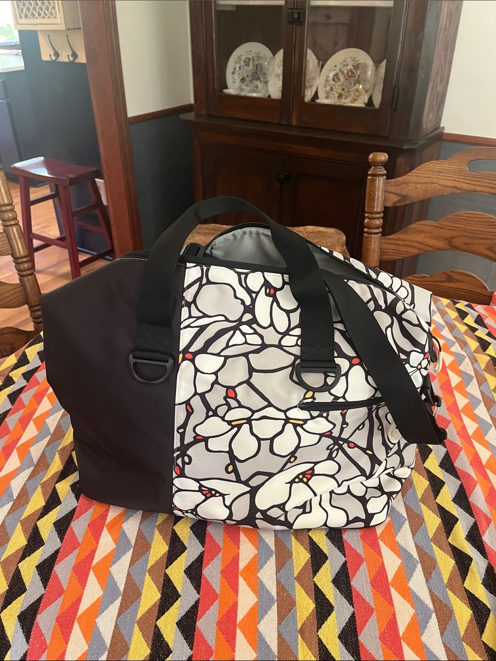 Sherpani Black & White Floral-Pattern Duffel with Subtle Red and Yellow Accents - Picture 3 of 11